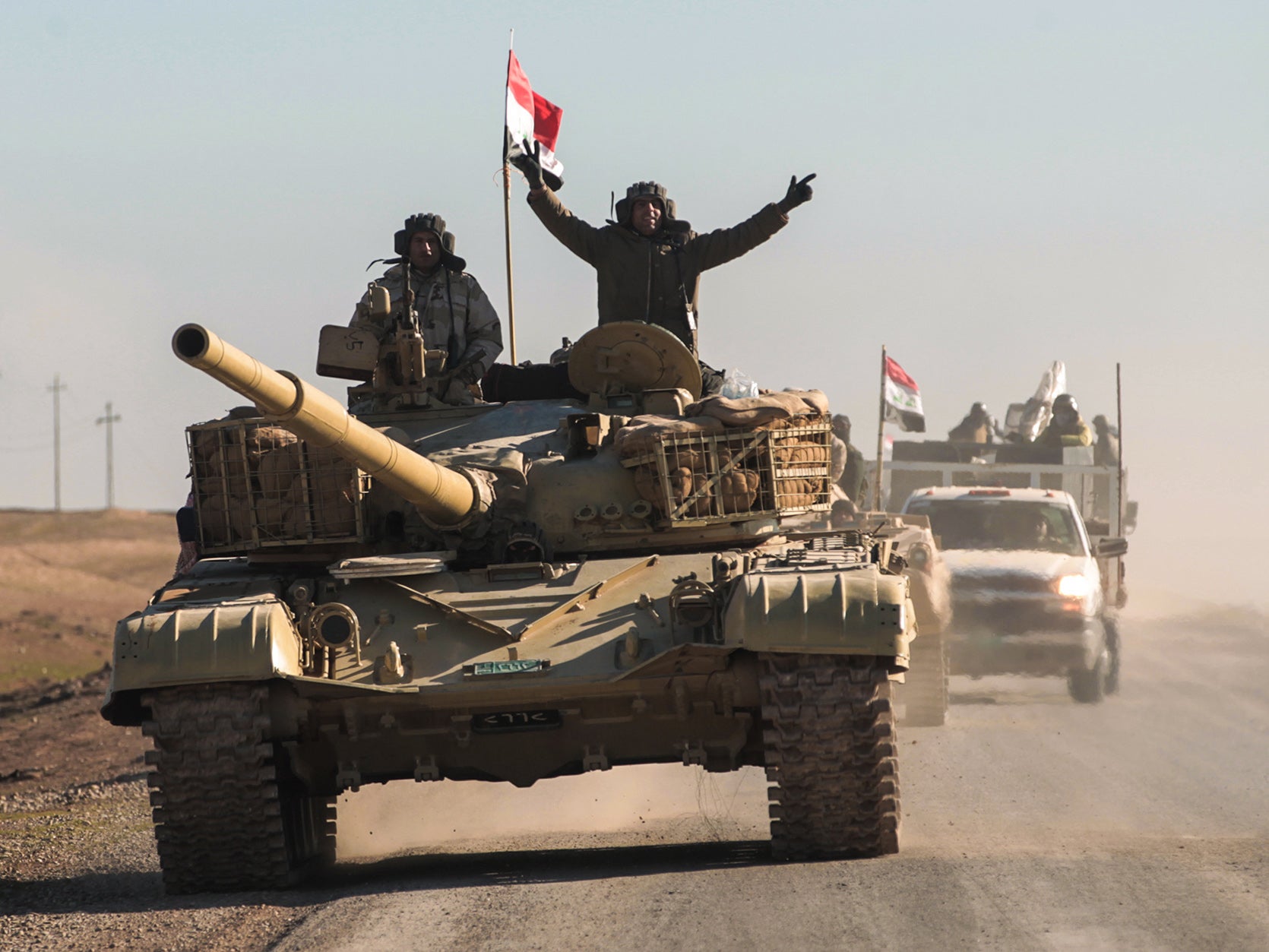 Iraqi forces advance on Mosul where a climactic battle has begun to rid the city of Isis