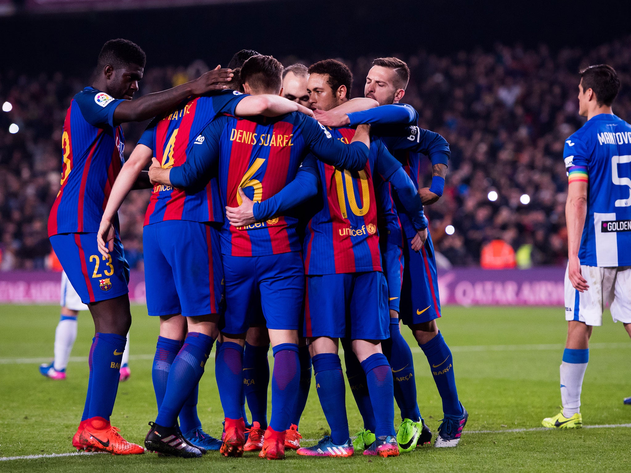 Barcelona celebrate following Messi's late penalty