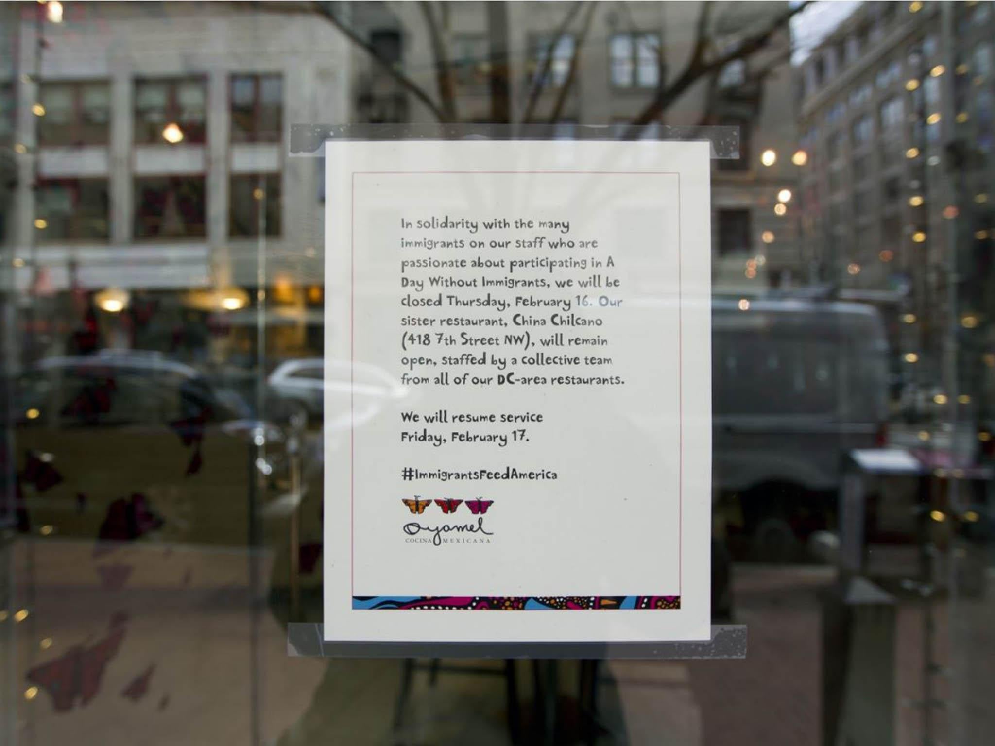 A flier on the window of Oyamel in Washington explains the closure (AP)