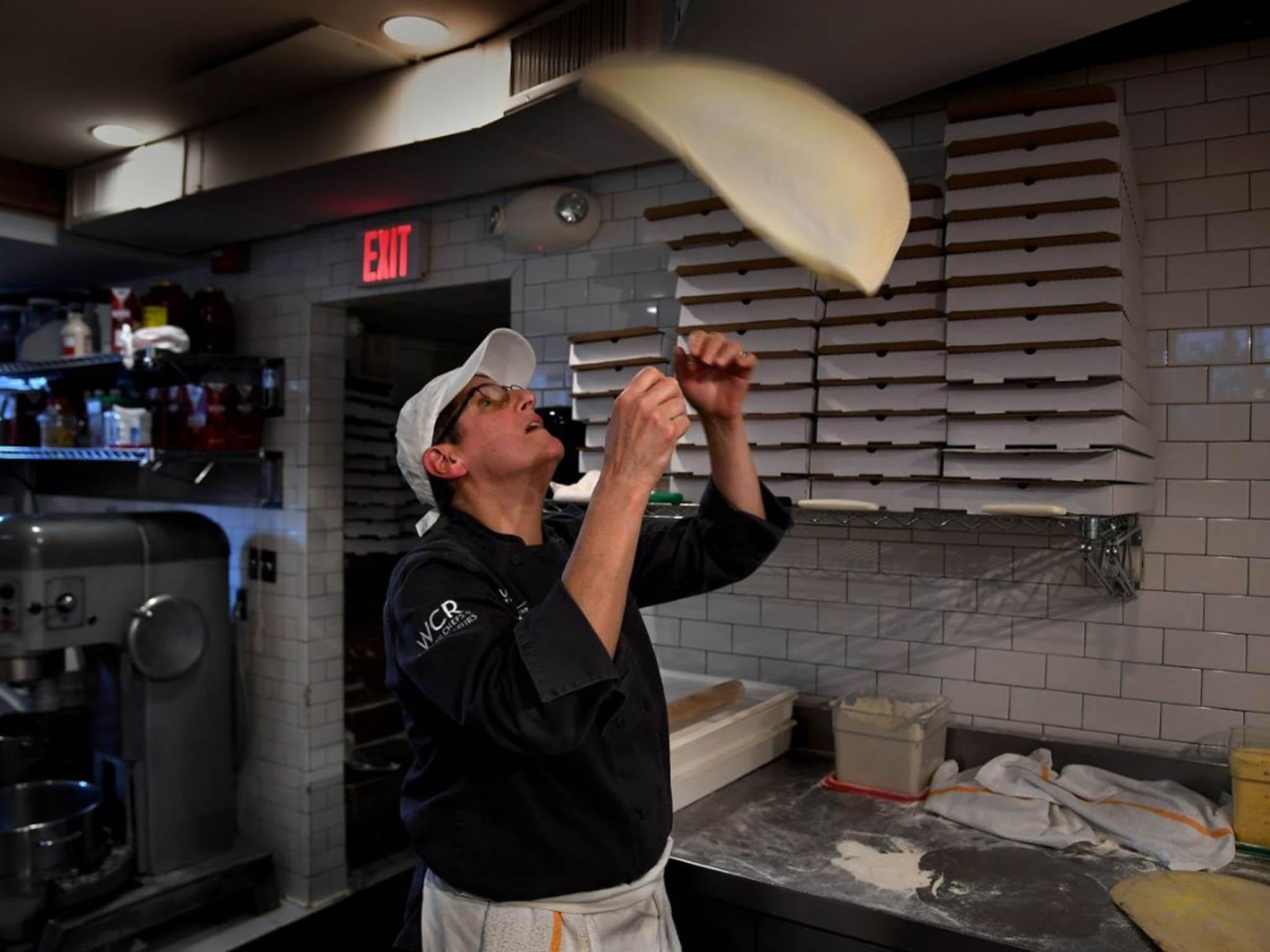 Ruth Gresser, the owner of Pizzeria Paradiso still has her chops to flip pizza dough as she worked the lunch rush