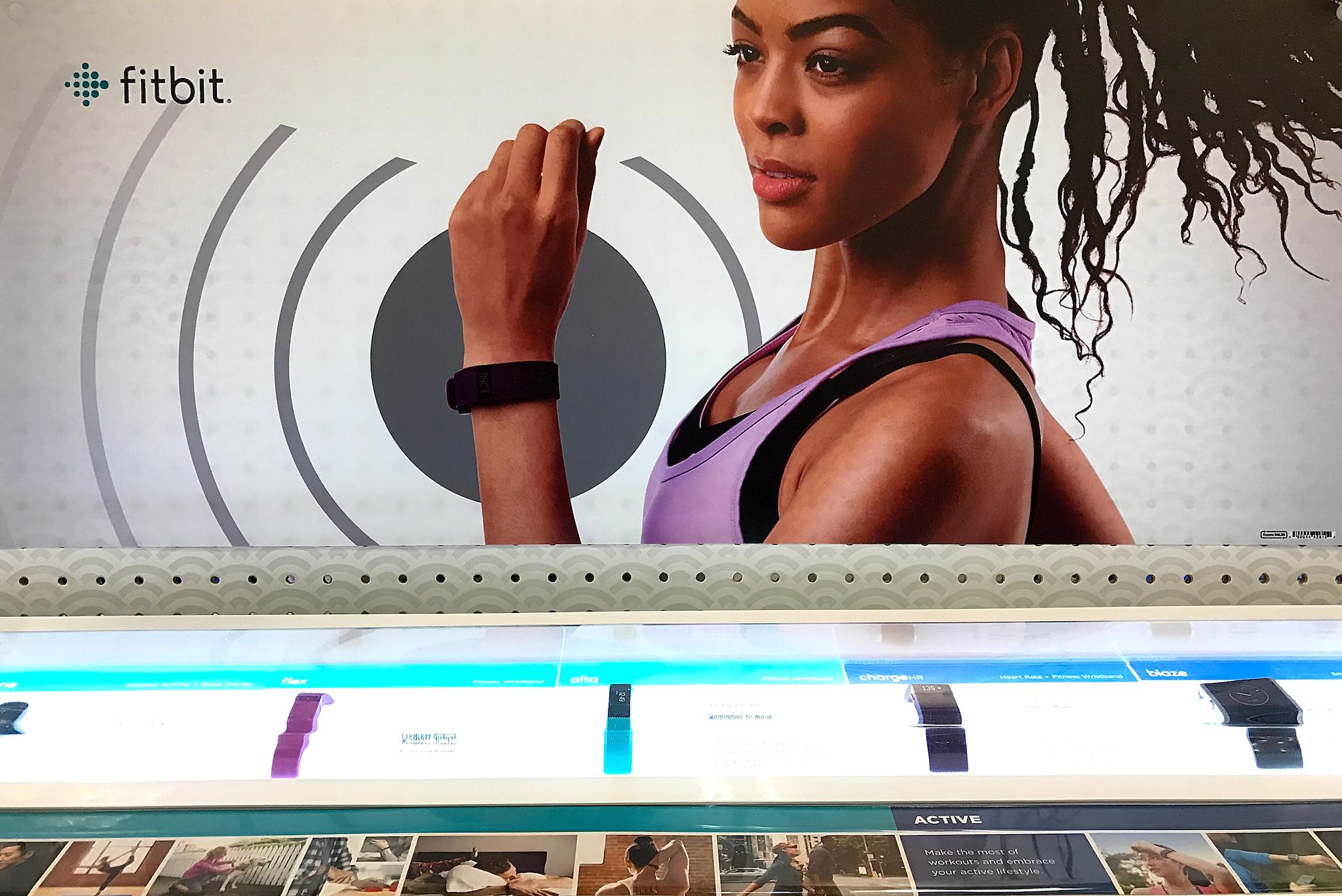 Fitbit fitness trackers are displayed on a shelf at a Target store on January 30, 2017 in Los Angeles, California