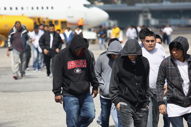 Guatemalan immigrants arrive in their home country after being deported from the US