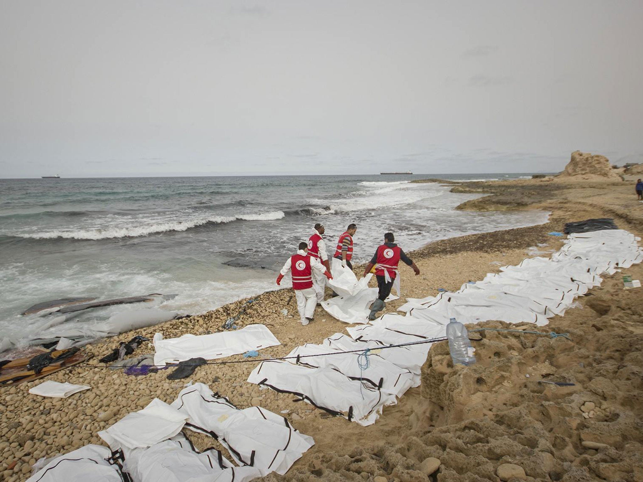 The bodies of 74 migrants washed ashore near the city of Zawiyah, a hub for smugglers launching boats towards Europe