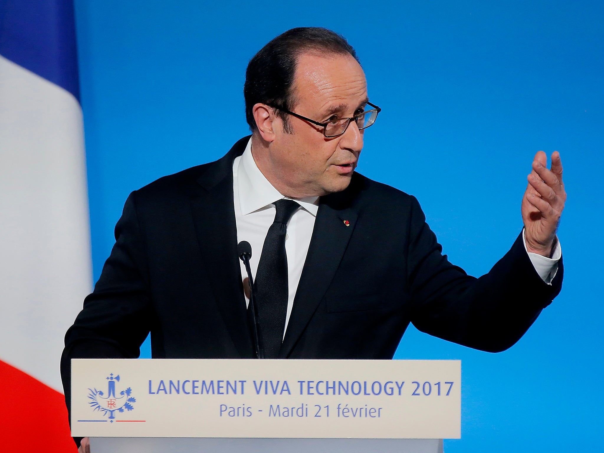 France's President Francois Hollande gestures as he speaks during the global tech conference Viva Technology in Paris at the Elysee Palace in Paris