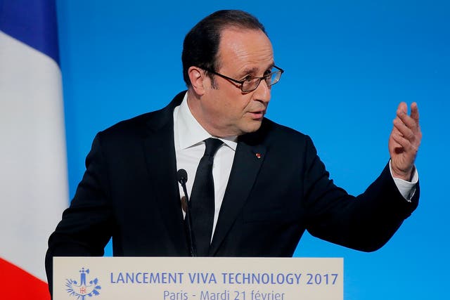 France's President Francois Hollande gestures as he speaks during the global tech conference Viva Technology in Paris at the Elysee Palace in Paris