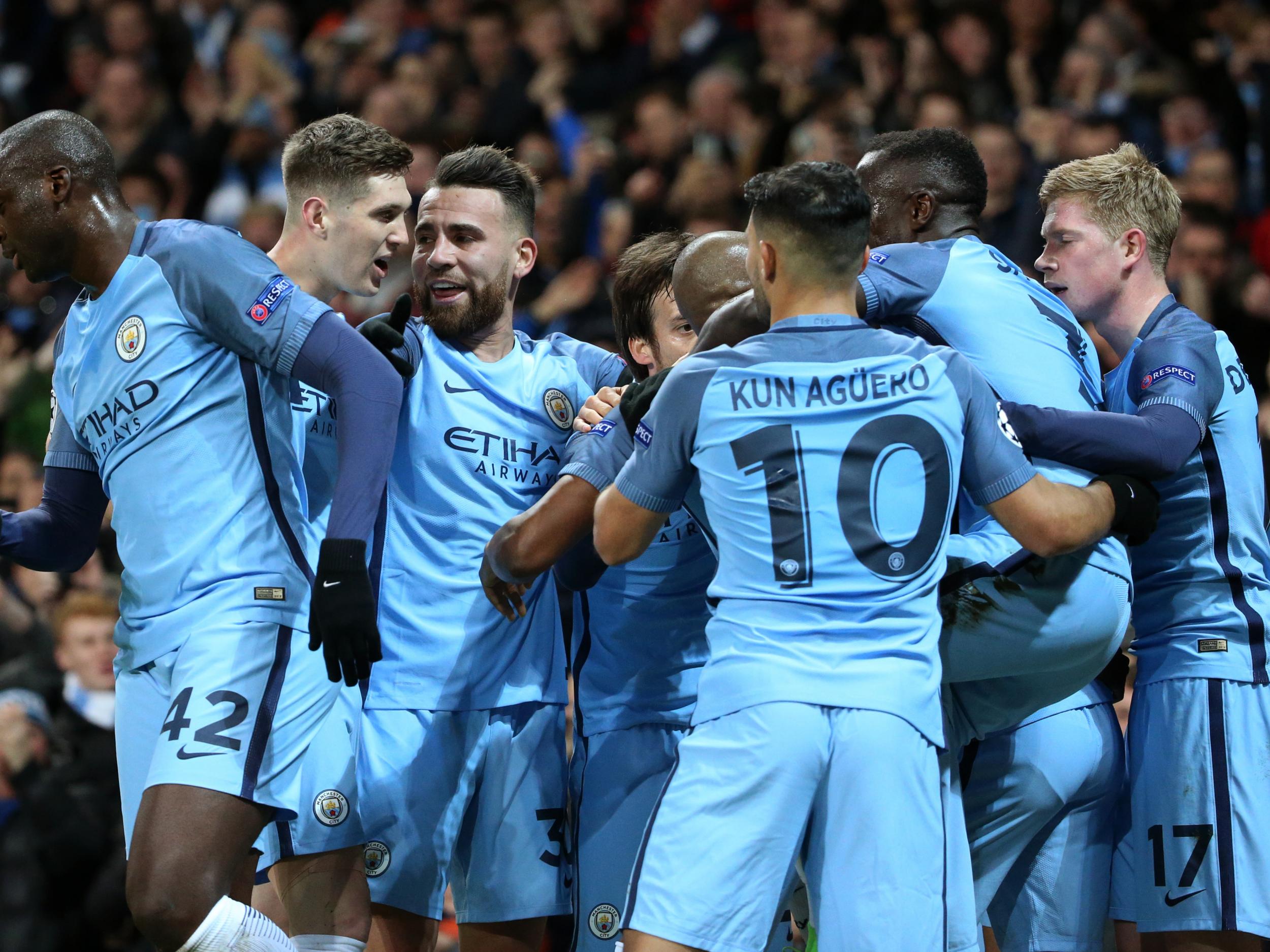 City's players celebrate Sane's fifth goal