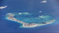 China finishing South China Sea buildings 'that could house missiles'