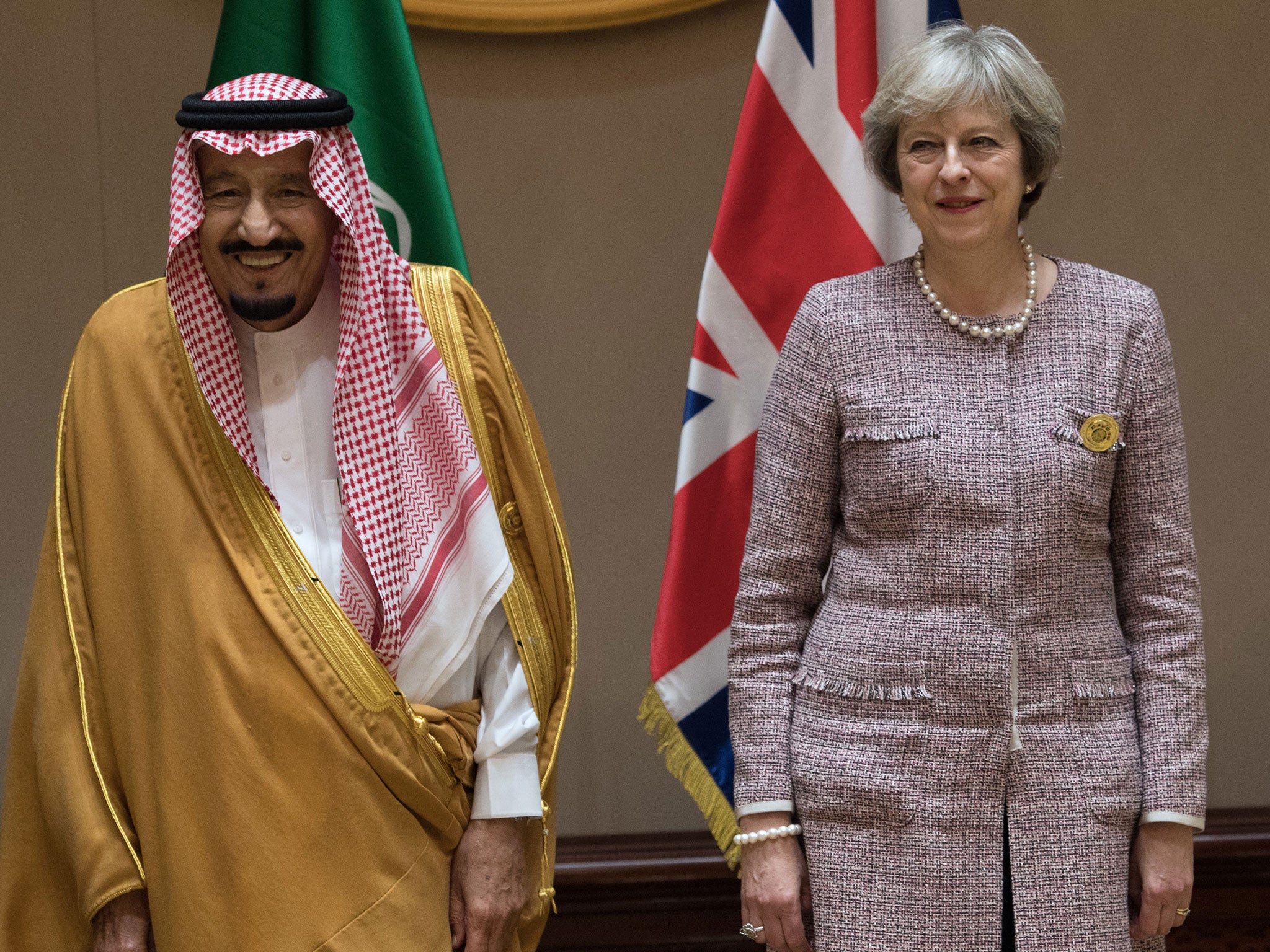 King Salman bin Abdulaziz of Saudi Arabia with Theresa May at the Gulf Cooperation Council summit in Bahrain in December