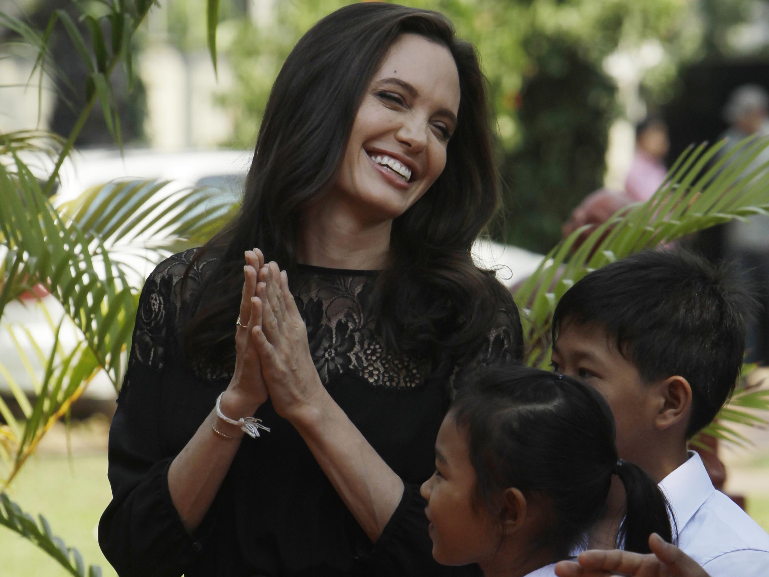 Hollywood actress Angelina Jolie smiles before a press conference in Siem Reap province, Cambodia, on February 18 2017