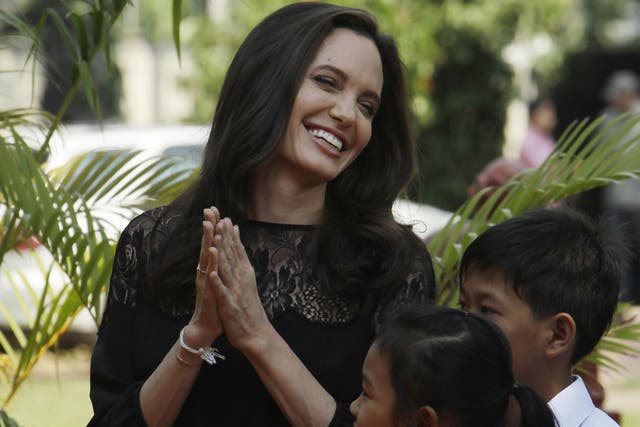Hollywood actress Angelina Jolie smiles before a press conference in Siem Reap province, Cambodia, on February 18 2017