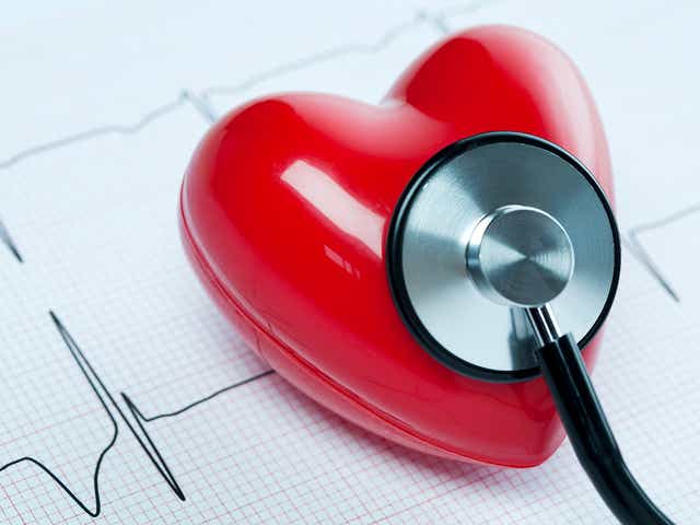 <p>Heart health concept. A heart shape on an electrocardiogram with a stethoscope. Slight blue tone. You may also like:</p>