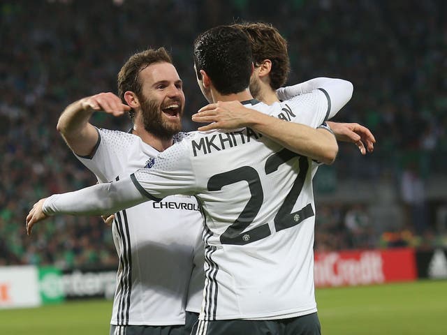 Juan Mata, Manchester United's stand-out player, celebrated with goalscorer Henrikh Mkhitaryan