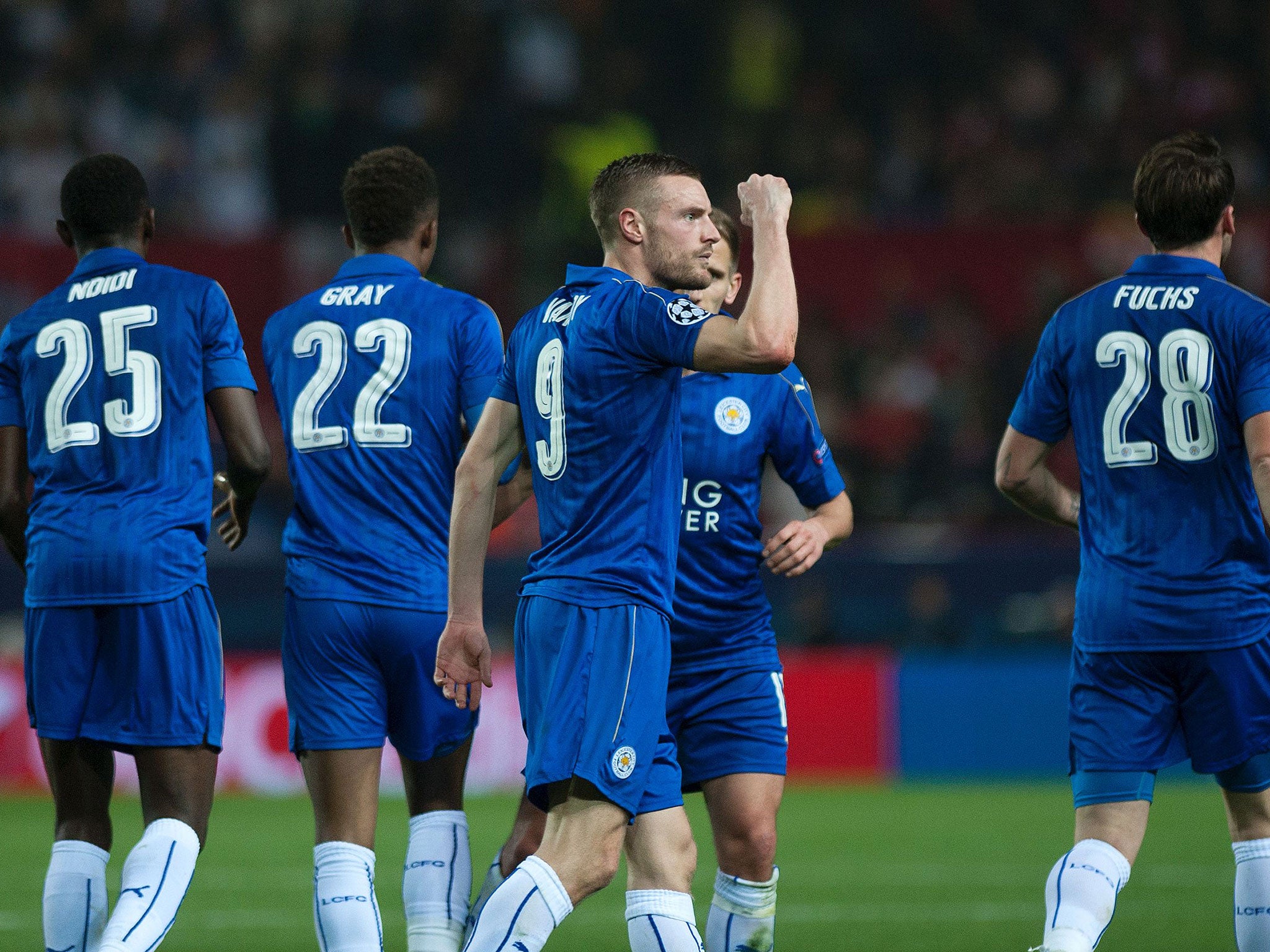 Vardy celebrates after scoring an important away goal for the Premier League champions