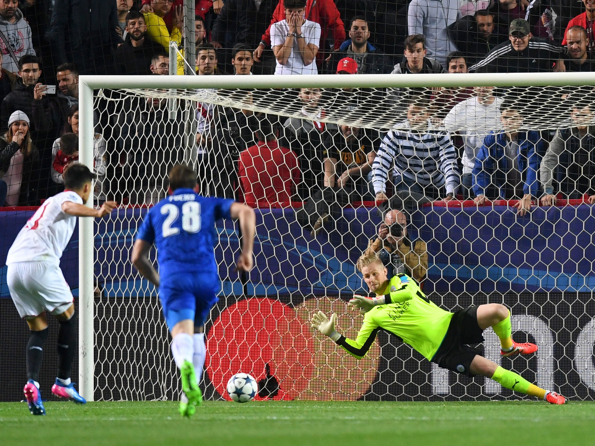Kasper Schmeichel saves a penalty attempt from Joaquin Corress to keep Leicester in the match against Sevilla