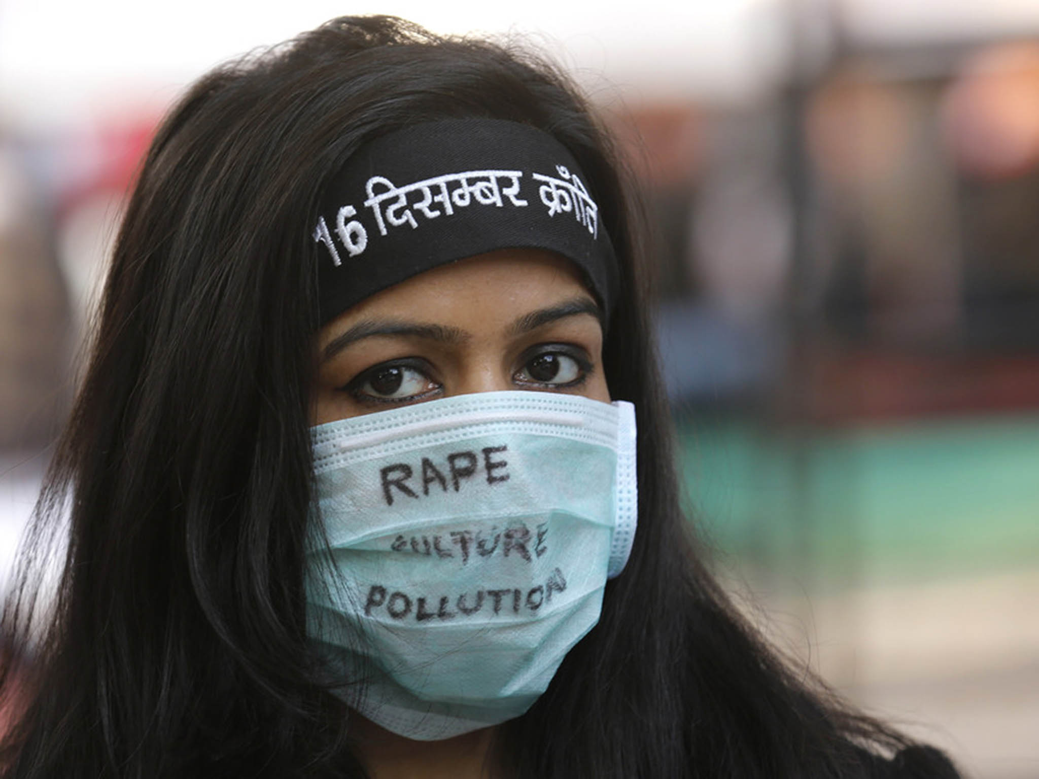 An activist takes part in a protest in December 2015 to mark the third anniversary of the Delhi bus gang rape