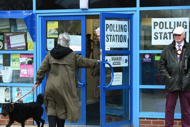 Voters arrive at The Willows Primary School polling station in Stoke as polling gets underway