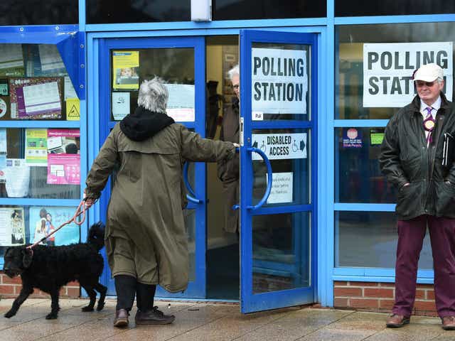 Voters arrive at The Willows Primary School polling station in Stoke as polling gets underway