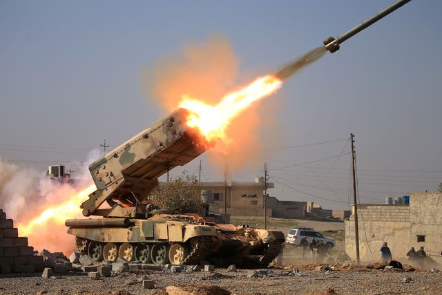 Iraqi army launch a rocket towards Isis fighters near Ghazlani military complex, south of Mosul