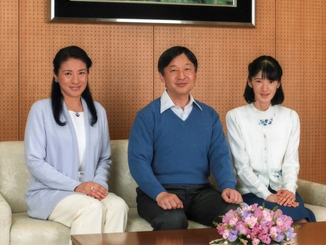 Japan's Crown Prince Naruhito with Crown Princess Masako (left) and their daughter Princess Aiko at Togu Palace in Tokyo