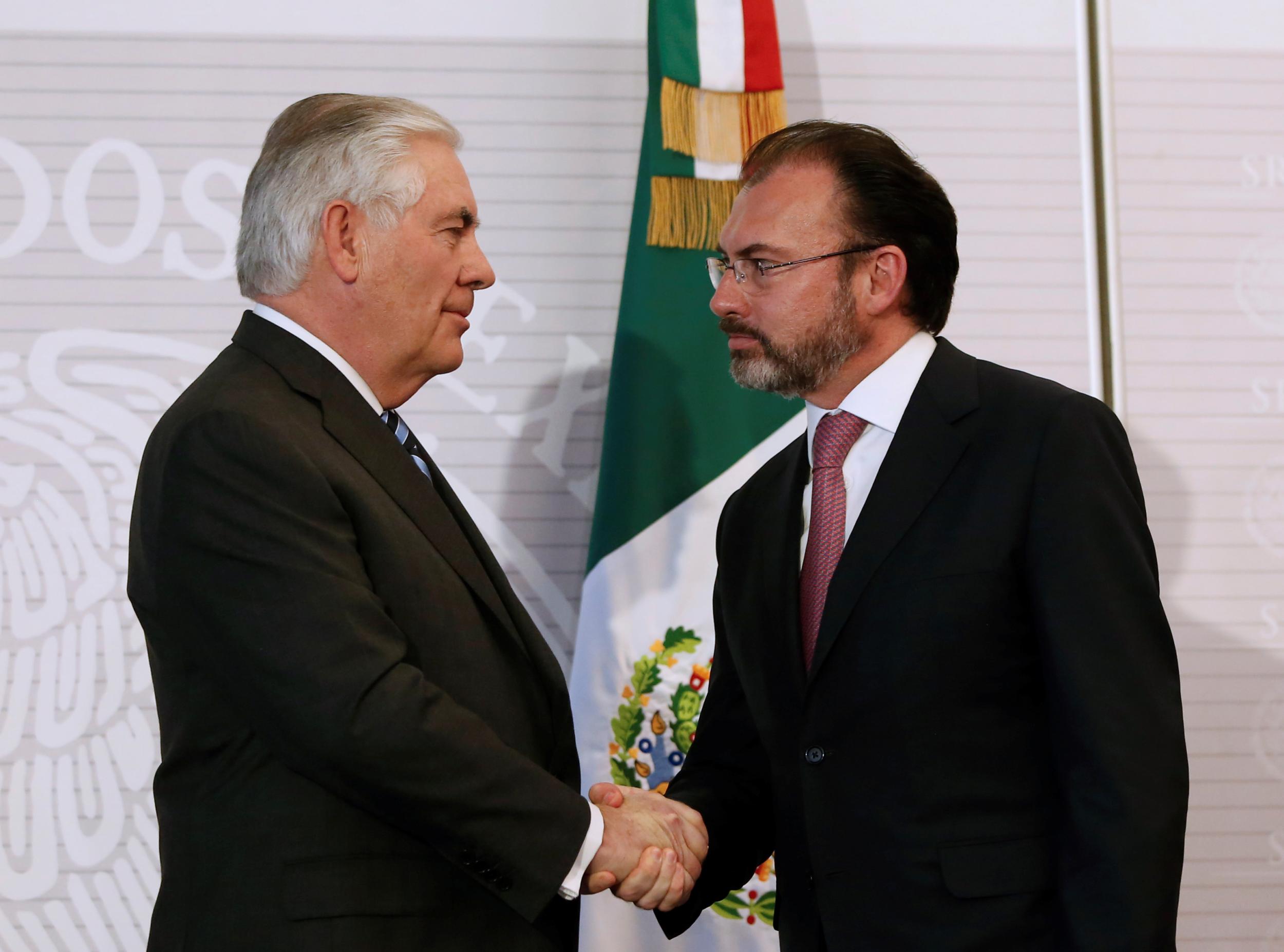 US Secretary of State Rex Tillerson and Mexico's Foreign Minister Luis Videgaray shake hands