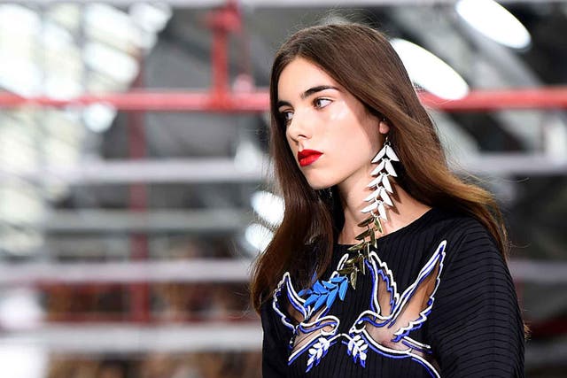 Mary Katrantzou's collection featured single olive-leaf earrings in electric blue, gold and yellow