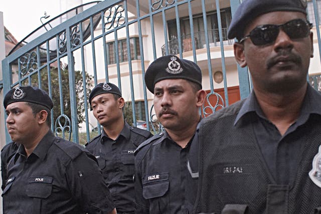 Malaysian Policemen outside the North Korean Embassy