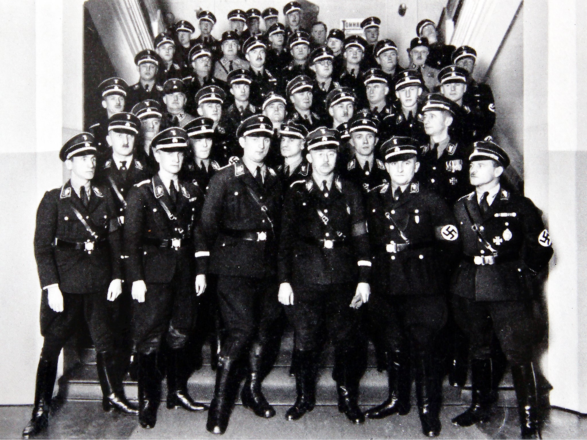 Heinrich Himmler (front row, centre, with glasses) with fellow SS men – his daughter wasn't the only one linked to him to find their way into Germany’s postwar intelligence