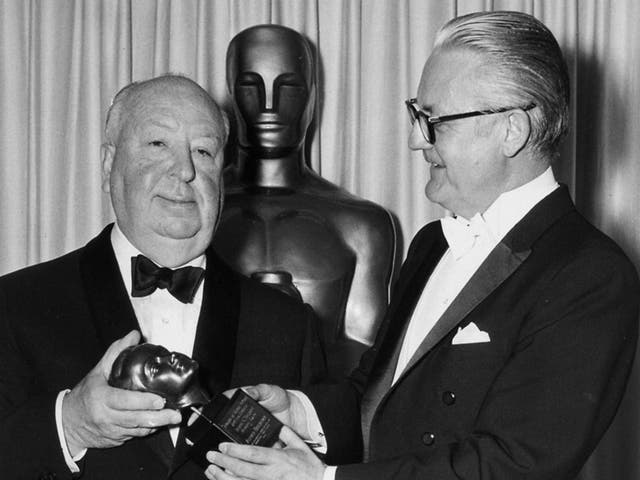 Alfred Hitchcock accepting the Irving G Thalberg Award from director Robert Wise at the 1968 Academy Awards. Hitchcock never won an Oscar for Best Director