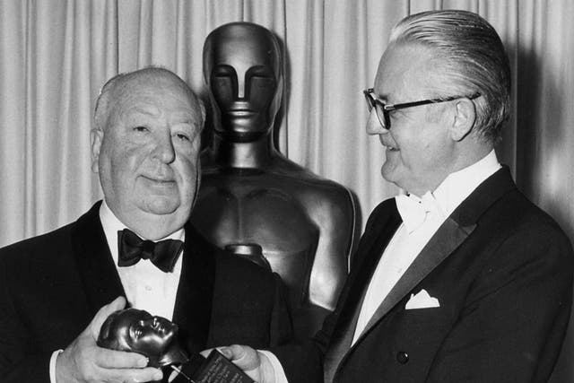 Alfred Hitchcock accepting the Irving G Thalberg Award from director Robert Wise at the 1968 Academy Awards. Hitchcock never won an Oscar for Best Director