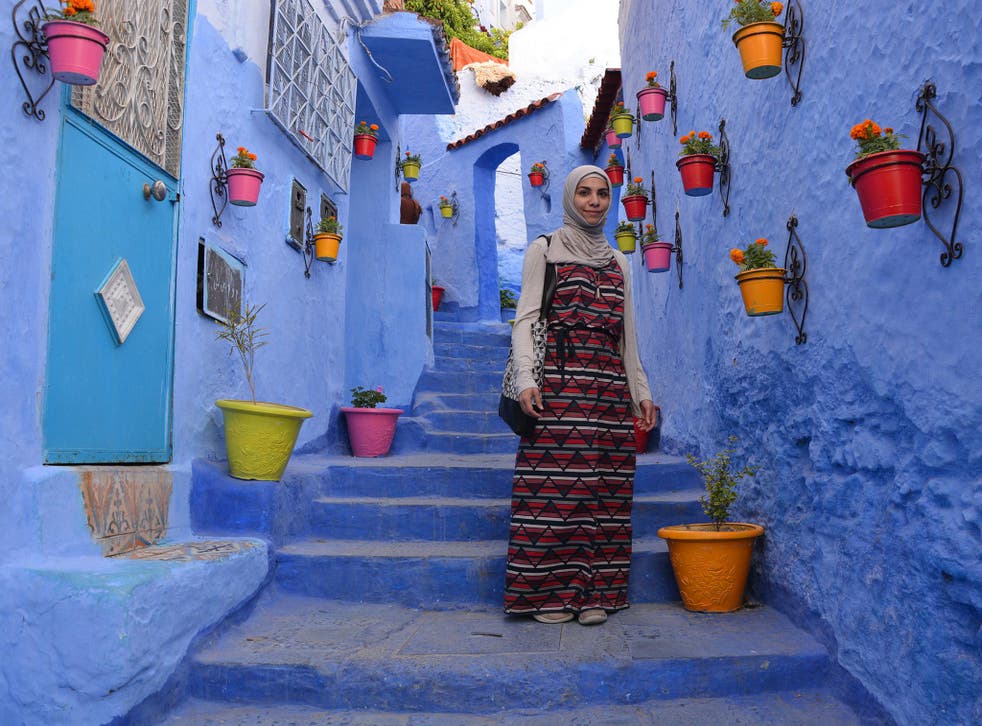 Esra Alhamal, pictured here in Morocco, has travelled to dozens of countries 