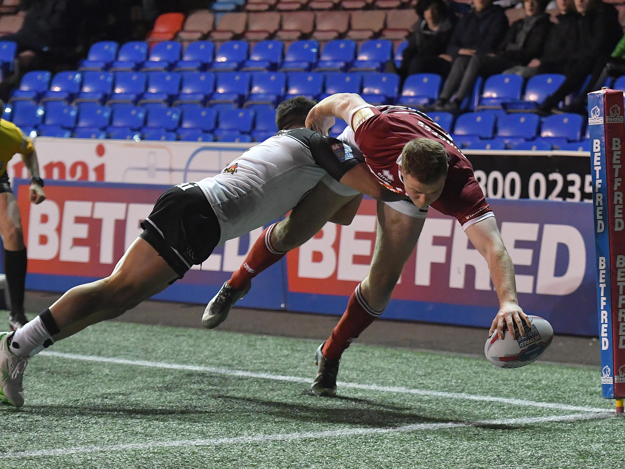 Wigan Warriors' Joe Burgess scores his sides 3rd try