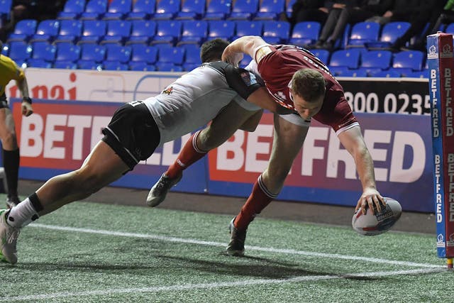 Wigan Warriors' Joe Burgess scores his sides 3rd try