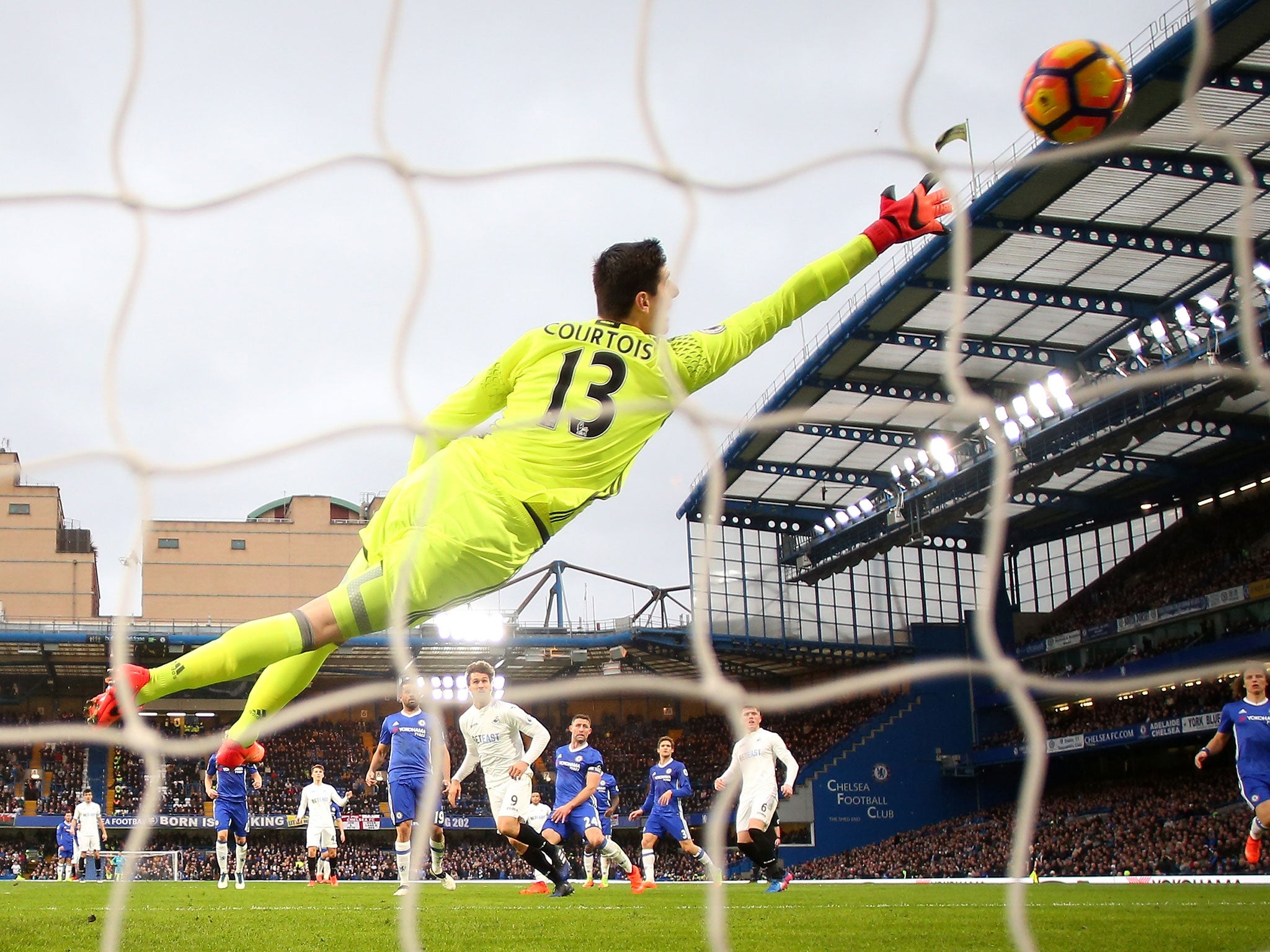 Thibaut Courtois is beaten at his right-hand side post by Swansea's Fernando Llorente