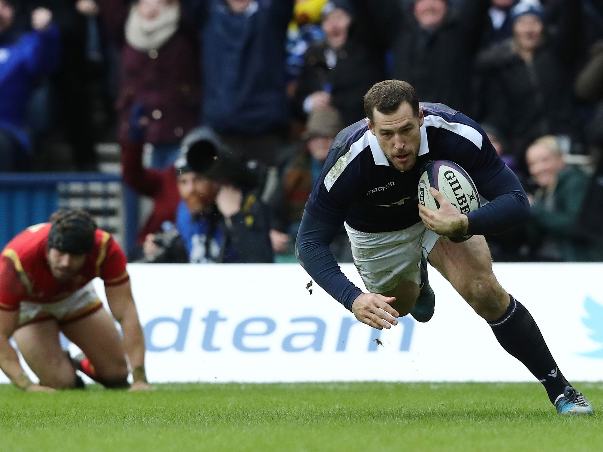 Tim Visser dives over to score Scotland's second try against Wales