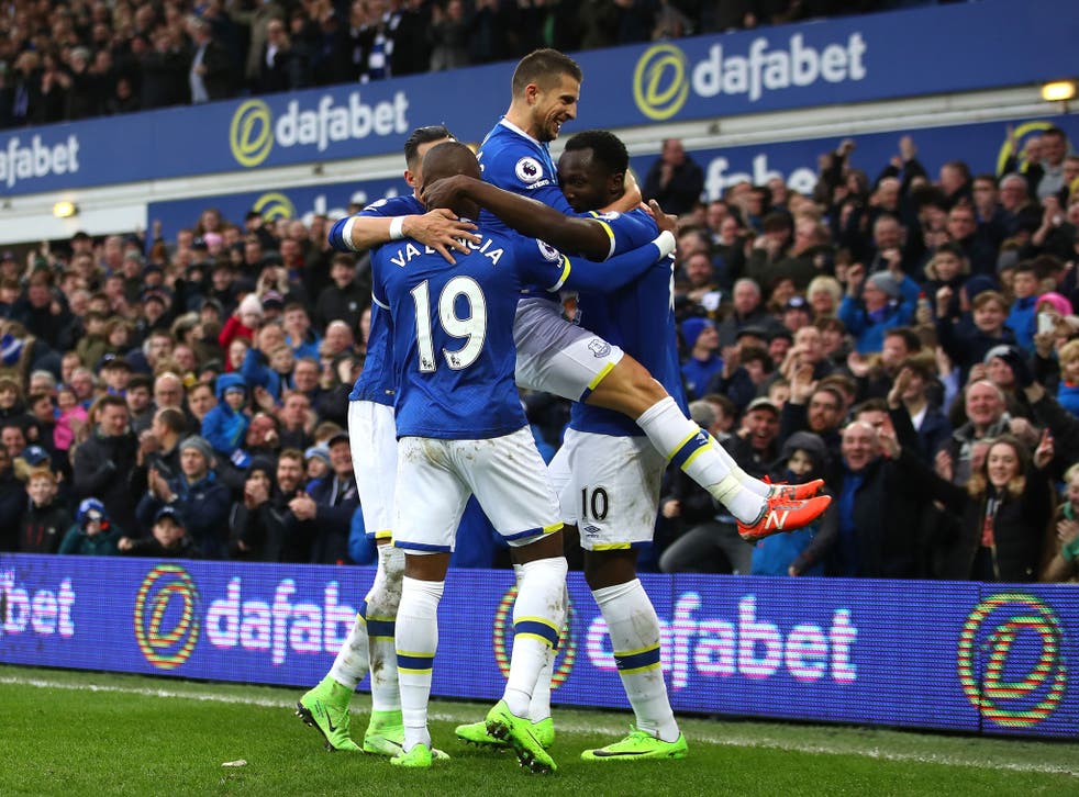 Everton's players celebrate with Lukaku after his goal secured victory for the home side