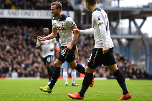 Kane celebrates his first goal for Spurs