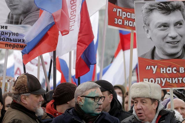 Green paint was thrown at former Russian prime minister and Liberal opposition leader Mikhail Kasyanov during the second anniversary of Boris Nemtsov's murder in Moscow