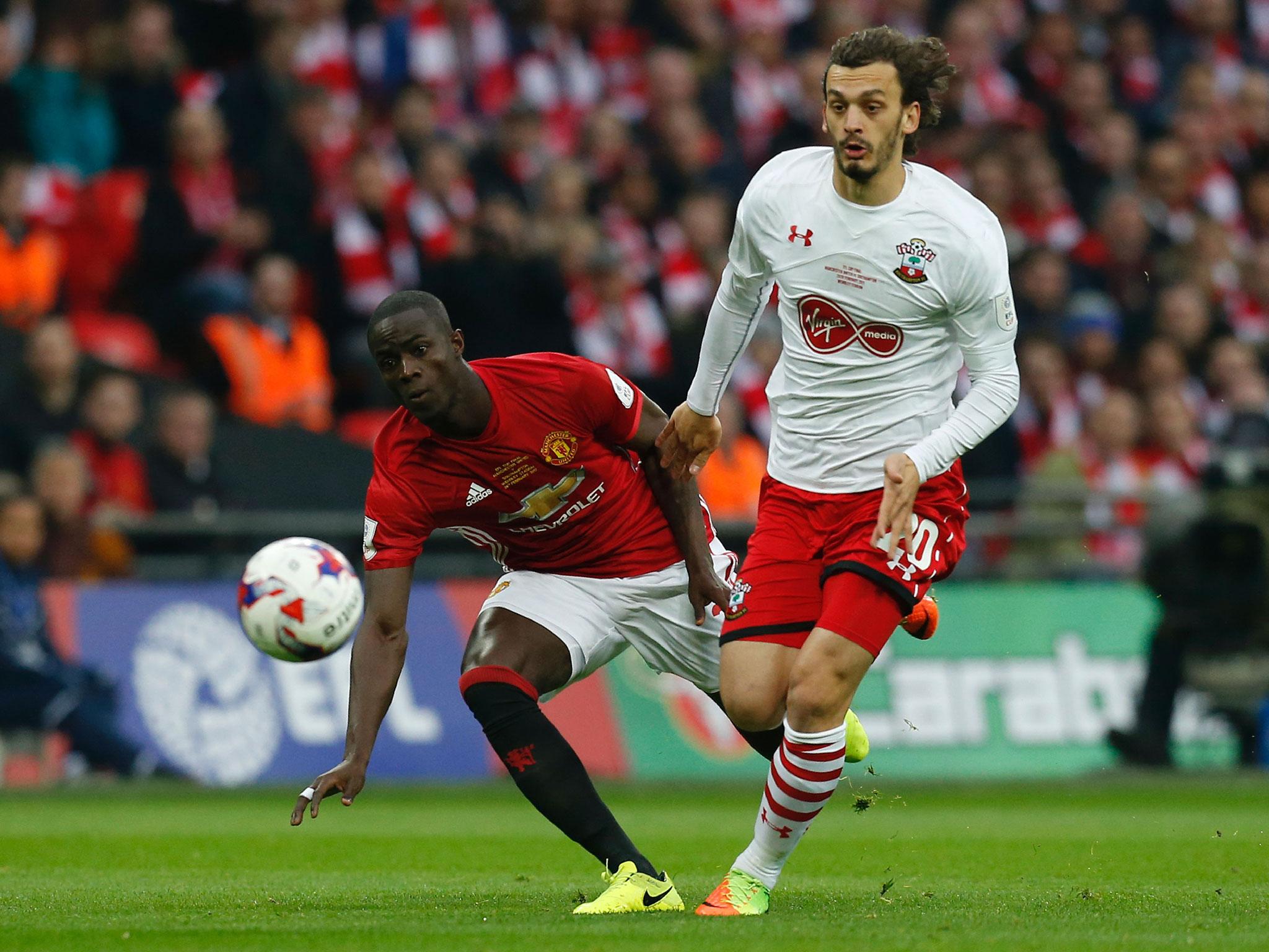 Gabbiadini bids to beat Bailly to a loose ball (Getty)