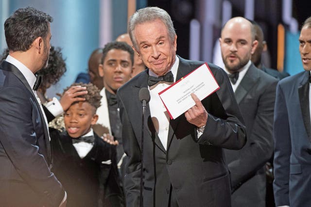 Shocked faces on stage at the Oscars as the real winner of the Best Picture award is revealed