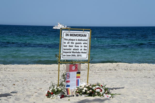 A memorial to the 38 people killed in the Sousse attack stands on the beach on the first anniversary of the attack