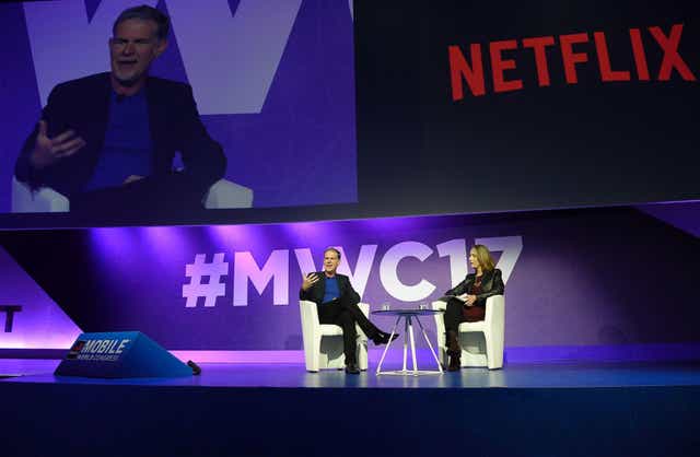 Founder and CEO of Netflix Reed Hastings speaks during a keynote speech at the Mobile World Congress in Barcelona on February 27, 2017