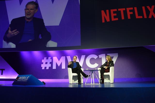 Founder and CEO of Netflix Reed Hastings speaks during a keynote speech at the Mobile World Congress in Barcelona on February 27, 2017