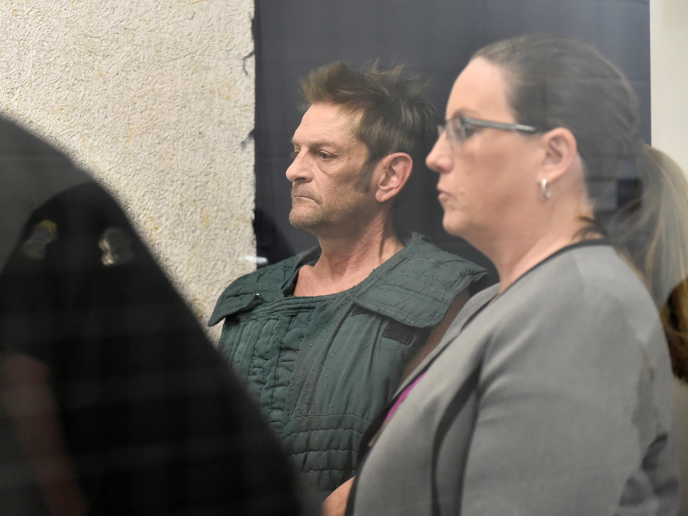 Adam Purinton, 51, appears with his public defender Michelle R. Durrett via video conference from jail during his initial court appearance in Olathe, Kansas