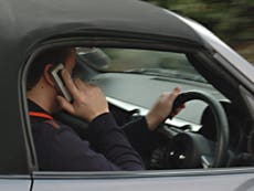 Fines for using mobile phone while driving set to double