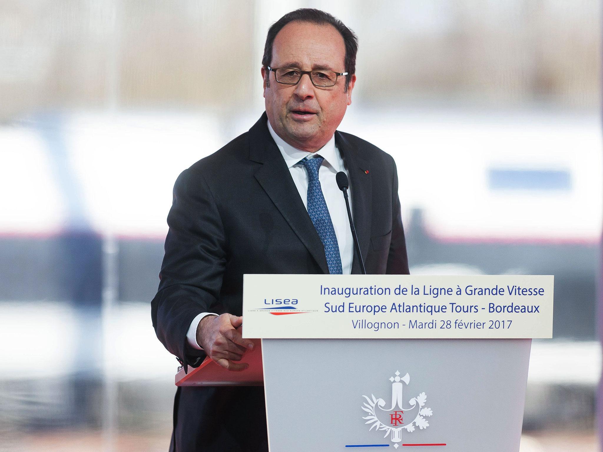 'I hope it is nothing serious,' Francois Hollande said as his speech was interrupted by the shot