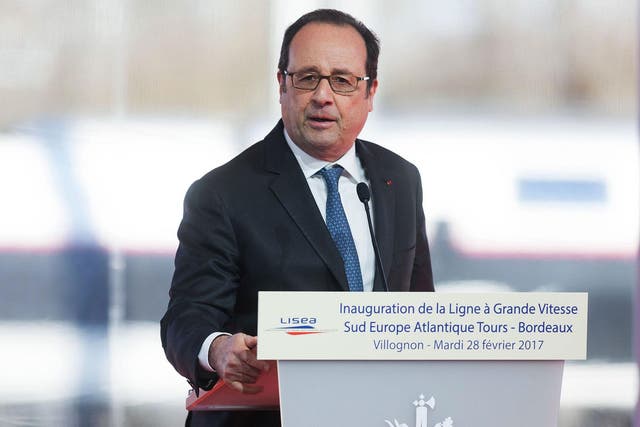'I hope it is nothing serious,' Francois Hollande said as his speech was interrupted by the shot
