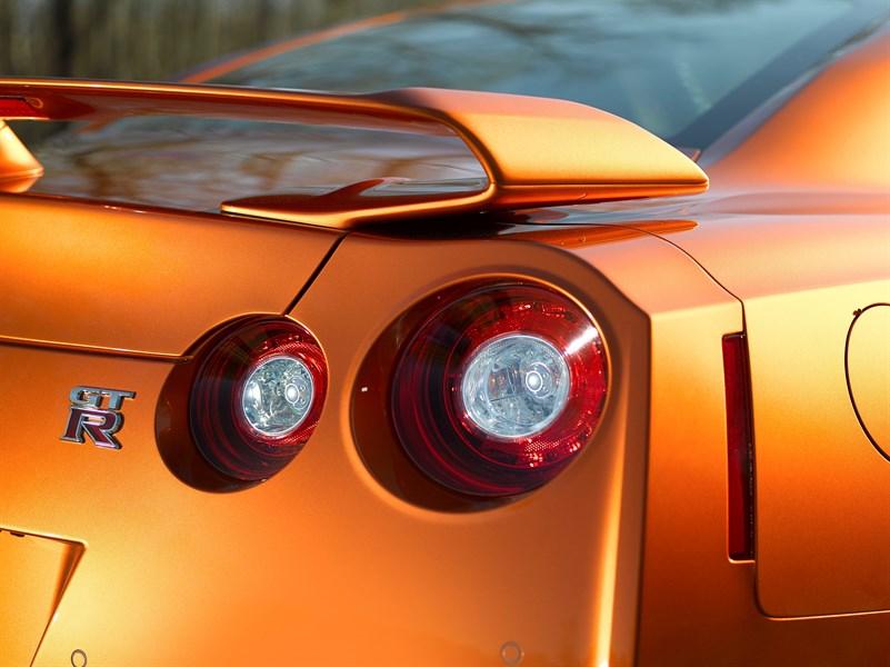 Metallic burnt “Katsura” orange suits the car’s dramatic coupe styling very well