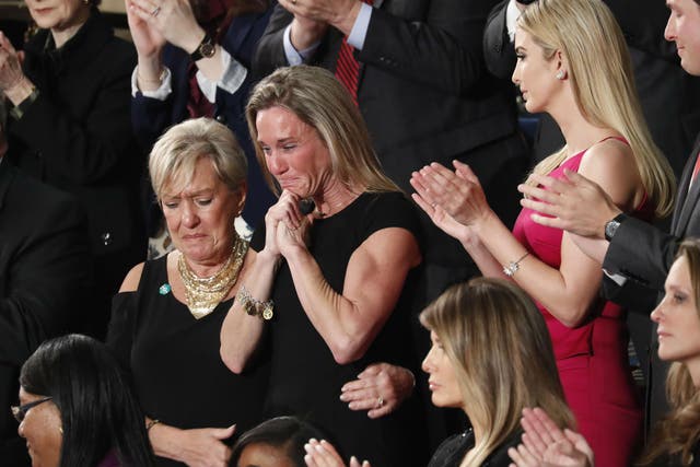 Mr Trump paid tribute to  Carryn Owens, the widow of a slain Navy SEAL