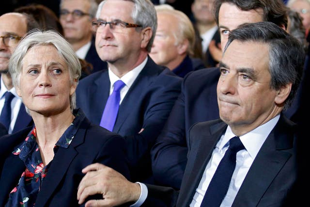 Francois Fillon (R) and his wife Penelope Fillon at political rally in Paris on 29 January