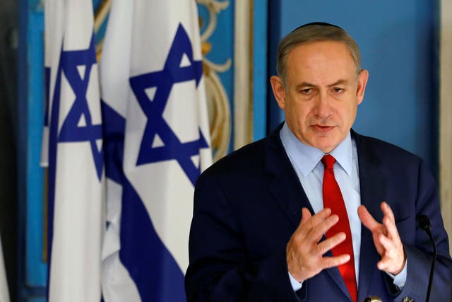 Israeli Prime Minister Benjamin Netanyahu speaks during an event marking International Holocaust Remembrance Day at the Yad Vashem synagogue in Jerusalem